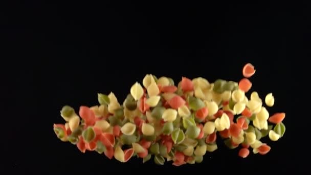 Pasta explosion on black background 500fps — Stock Video