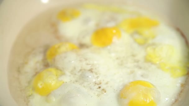 Chicken fried eggs — Stock Video