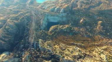 Cevheri ocağı üzerinde uçan