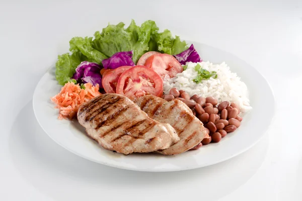 Plato con carne, arroz y frijoles — Foto de Stock