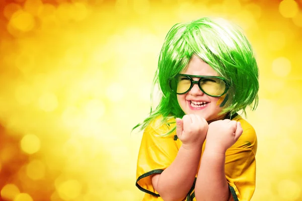 Boy in glasses dressed in football shirt — Stock Photo, Image