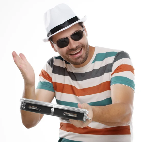 Man in colorful shirt and glasses with tambourine — Stock Photo, Image