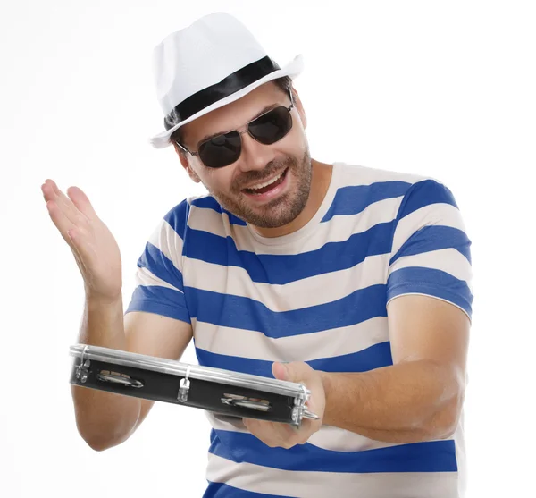 Man in colorful shirt and glasses with tambourine — Stock Photo, Image