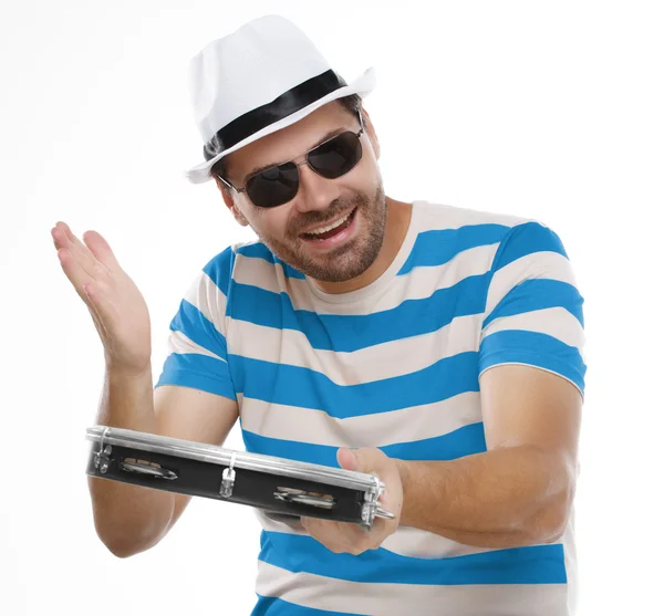 Man in colorful shirt and glasses with tambourine — Stock Photo, Image