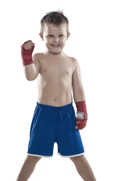 Child boxer in shorts and bandages — Stock Photo, Image