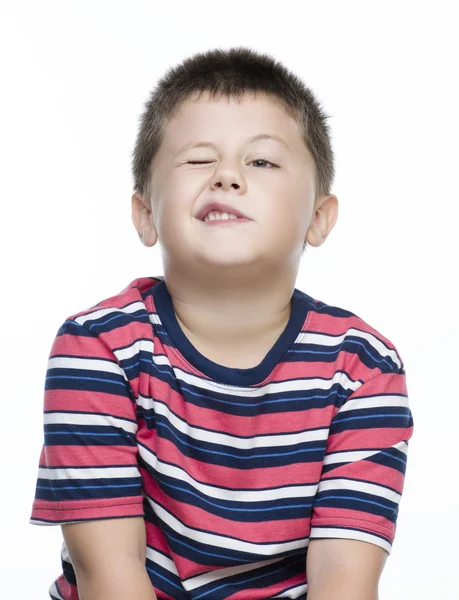 Niño parpadeando su ojo — Foto de Stock