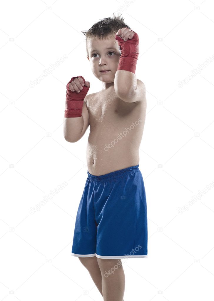 Child boxer in shorts and bandages