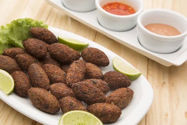 minced meat and bulghur wheat fried snack.