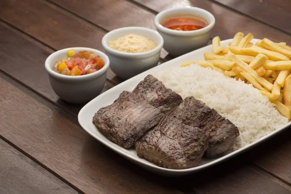 Roasted potatoes, rice — Stock Photo, Image