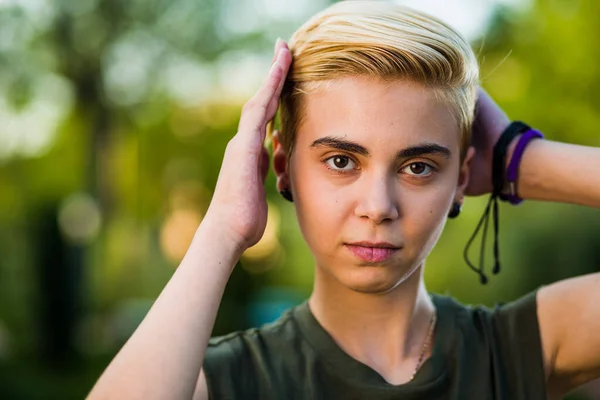 Tomboy androgynous lesbian non binary beauty in casual clothes gender lgtbi sex education. Sexual identity discrimination is a social problem in a diversity orientation like lesbian, homosexuality