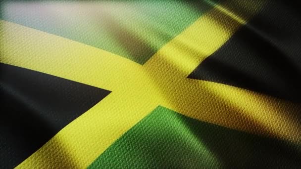 4k Jamaica National flag wrinkles wind in Jamaican seamless loop background. Royalty Free Stock Video