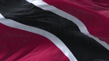4k Trinidad ve Tobago Ulusal bayrak kırışıklıkları mavi gökyüzünde pürüzsüz rüzgar döngüsü