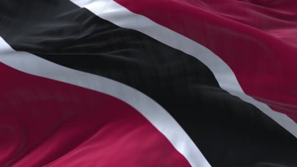 4k Trinidad y Tobago Las arrugas de la bandera nacional envuelven el viento sin fisuras en el cielo azul ba — Vídeo de stock