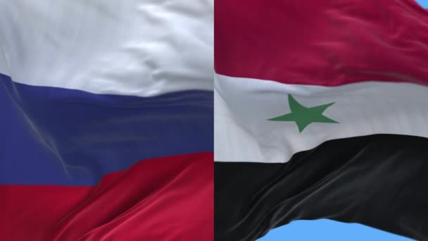 4k Rosja i Syria Flaga narodowa płynne tło pętli, Wiatr wieje zmarszczki. — Wideo stockowe