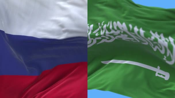 4k Rusia y Arabia Saudita Bandera nacional sin costuras de fondo, El viento sopla arrugas — Vídeo de stock