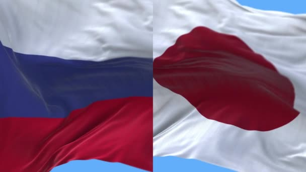 4k Rusia y Japón bandera nacional sin costuras bucle fondo, viento soplar arrugas. — Vídeo de stock