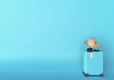 COVID-19 zamanında seyahat edin. Mavi bavul, tıbbi maske, güneş gözlüğü, şapka ve kamera mavi arka planda. Metin için boş alan. 3B resimleme.