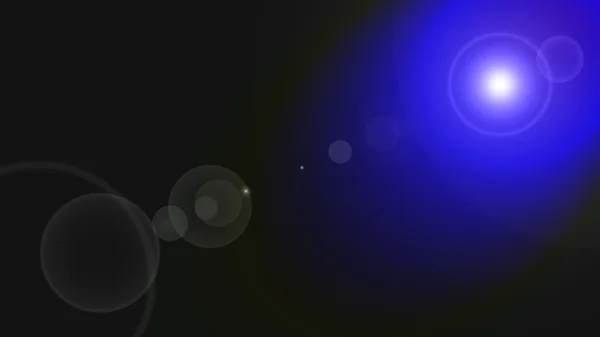 White and blue lens flare photo effect produced by refracted light on black dark background. Suitable for presentations, web, backdrops, prints and overlaying text — Zdjęcie stockowe