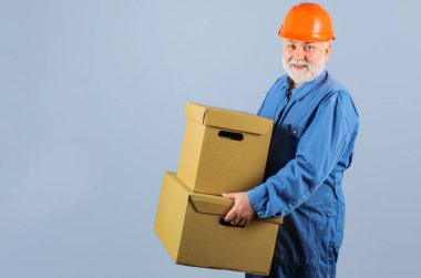 Bearded man with cardboard boxes. Delivery from store. Online shopping. Shipment.
