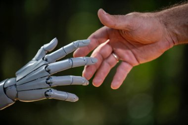Robot insan tokalaşması insanlık dışı. Robot insan tokalaşan android insansı. Robot insan tokalaşması dijital biyomühendislik. Robot insan tokalaşması biyoteknoloji mühendisliği