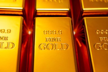 Altın külçeleri. Metal altın desenli. Ticaret için altın. Yatırım için altın