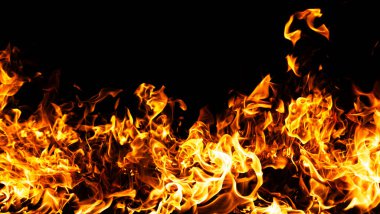 Ateş yoğun alev hareketi. Ateş soyut biçimde yanar. Ateş dramatik bir şekilde parlıyor. Ateş güçlü alev kavramı