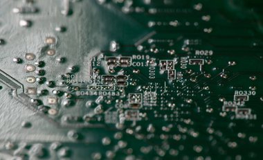 Entegre elektronik devre kartı. Donanım arka planında devre kartı. Bilgi işlemek için devre kartı. Devre tahtasını soyut doku olarak göster