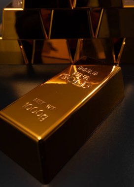 Lüks altın külçeleri. Altın bar stüdyo geçmişi. Metal altın desenli. Altın ve bankacılık kavramları