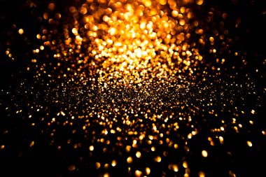 Tatil duvar kâğıdı için altın arka plan. Metalik yüzeydeki altın doku. Soyut arka planda altın sanatsal. Web sitesi için altın prim