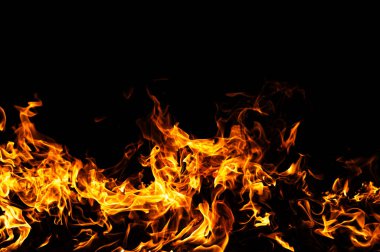 Ateş yoğun alev hareketi. Ateş soyut biçimde yanar. Ateş dramatik bir şekilde parlıyor. Ateş güçlü alev kavramı