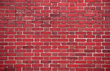 Duvarda tuğlalar var. Duvarcılıkta tuğlalar. Kırmızı tuğlalı tuğlalar. Duvardaki tuğlalar