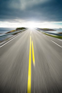 Coastal highway road in motion clipart