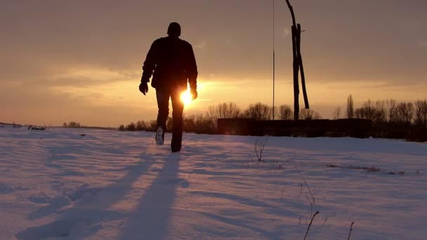 Farmer checking on water well in winter. — Stock Video