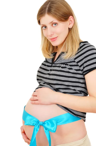 Krásná těhotná žena něžně drží její břicho s nlue ri — Stock fotografie
