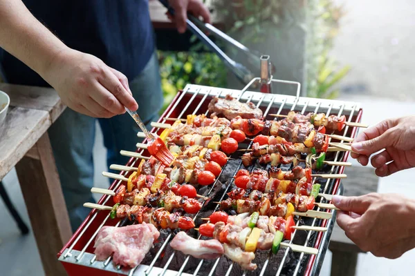 Close up cooking barbecue in gardern.