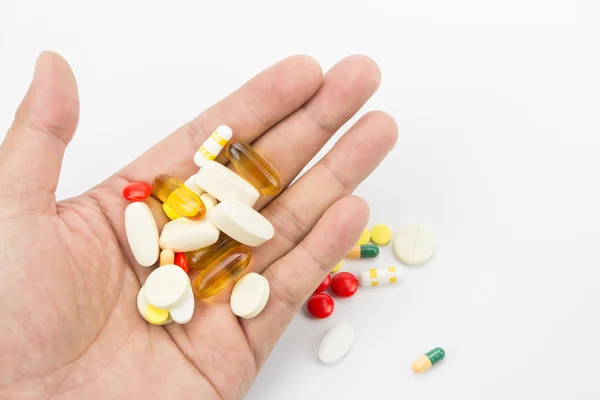 Diverse piller till hands — Stockfoto