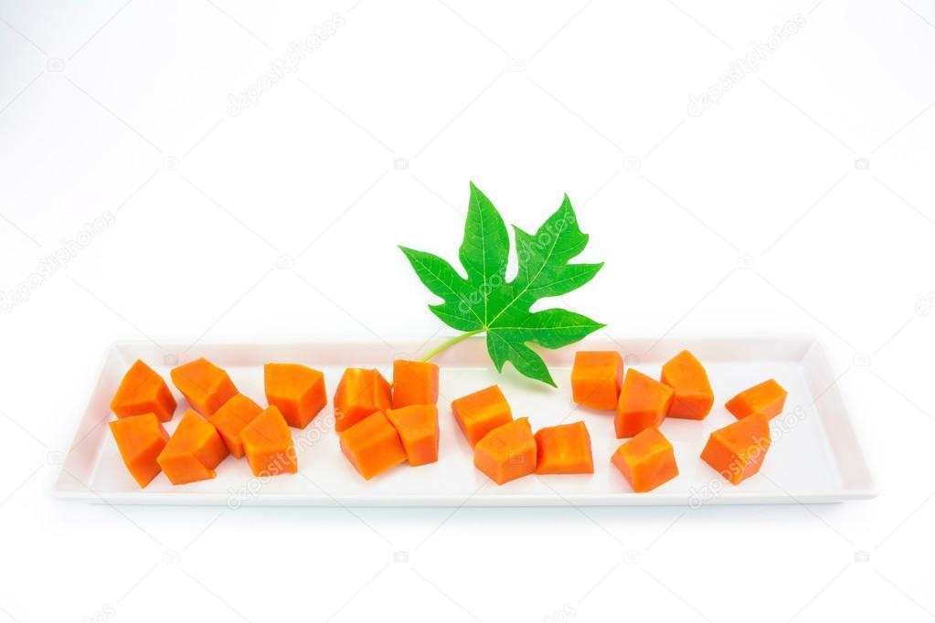 Sweet papaya slice on white ceramic dish bord isolated on white background