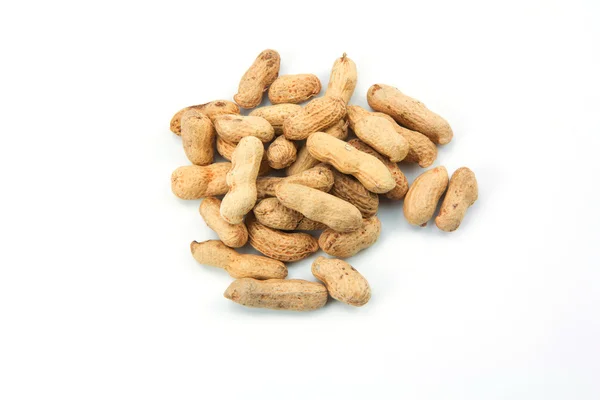 Dry peanuts isolated on white — Stock Photo, Image