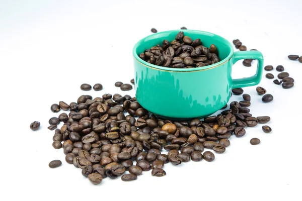 Coffee beans in coffee cup — Stock Photo, Image