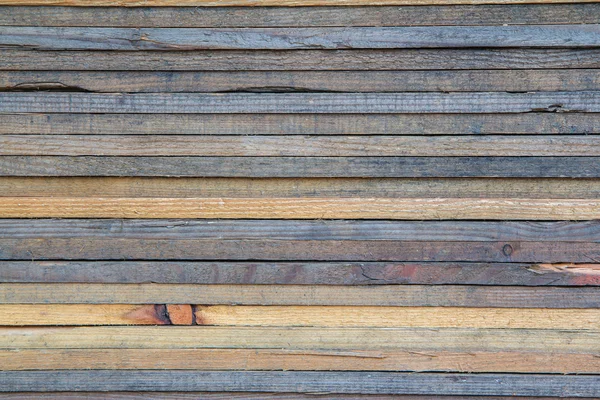 堆栈的木材为背景 — 图库照片