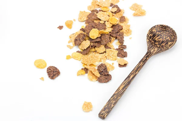 Cereal and wooden spoon on white background — Stock Photo, Image