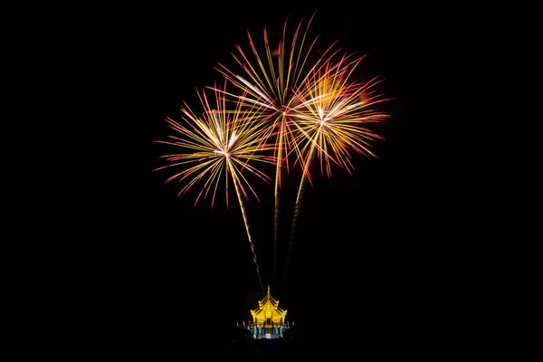 Colorful fireworks over dark sky — Stock Photo, Image