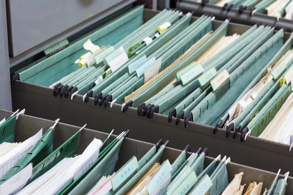 Carpetas de archivo en un archivador — Foto de Stock