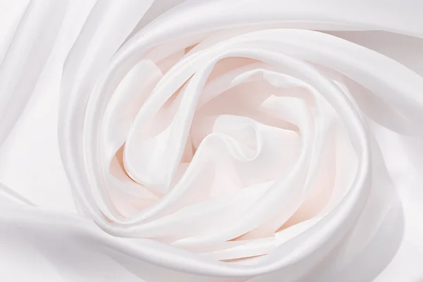 Mantel de lino textil de color blanco con hermosos pliegues. Superficie de tela como fondo. — Foto de Stock