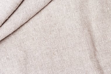 Çuval bezi arka planda. Doğal pamuk kumaş dokusu perde arkası için kalın kumaşı kapatır. 