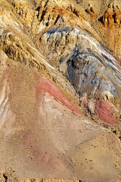 Natural colorful texture in Altai mountains, place named Mars 2, Altai Republic, Russia. Colorful hills, nature environment background. Unearthly Martian landscapes.