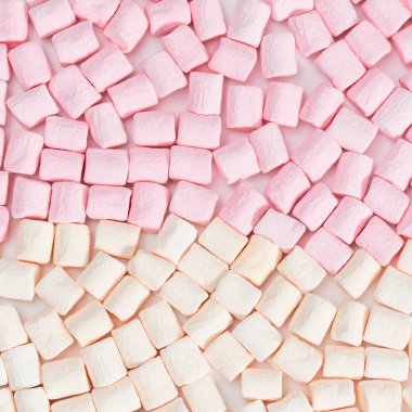 Marşmelov desenli arka plan. Marshmallow Pembe ve Beyaz Pastel Renkleri, tatlı yiyecekler. Üst görünüm.