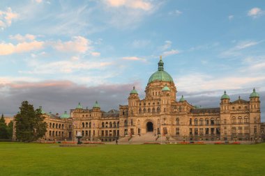 Neo-baroque architecture of Legislative Assembly Parliament Building of British Columbia in the provincial capital Victoria, B.C., Canada on a summer evening. clipart