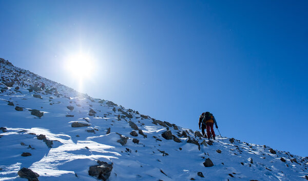 climbers at the mountain summit in Kyrgyzstan