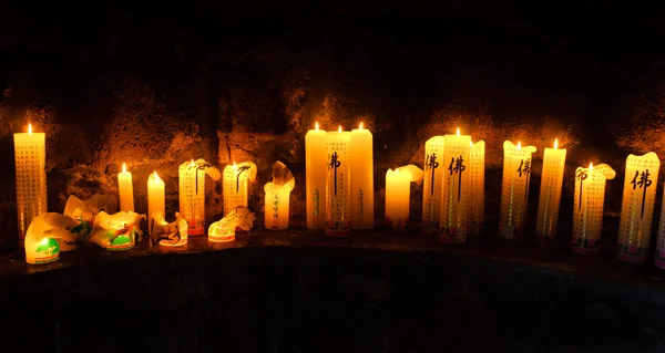 Buddhist altar with candles — Stock Photo, Image